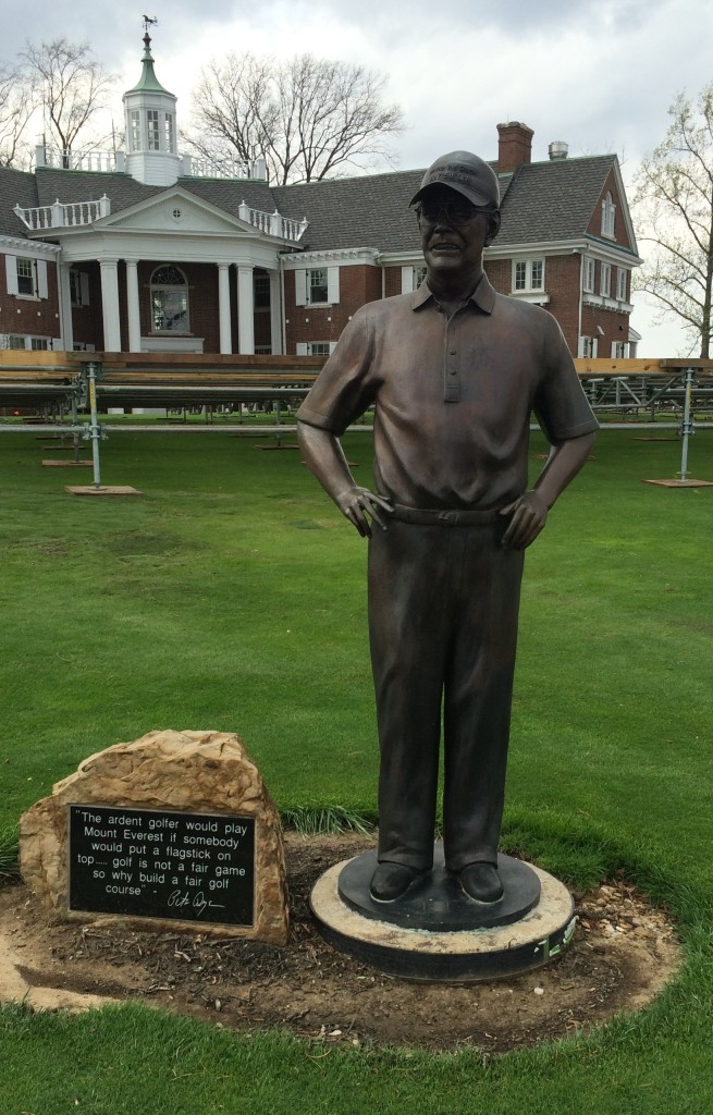 Bronze sculpture of Pete Dye in front of the Pete Dye Mansion on Mount Airie